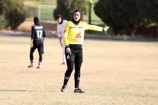 تام