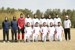 تام